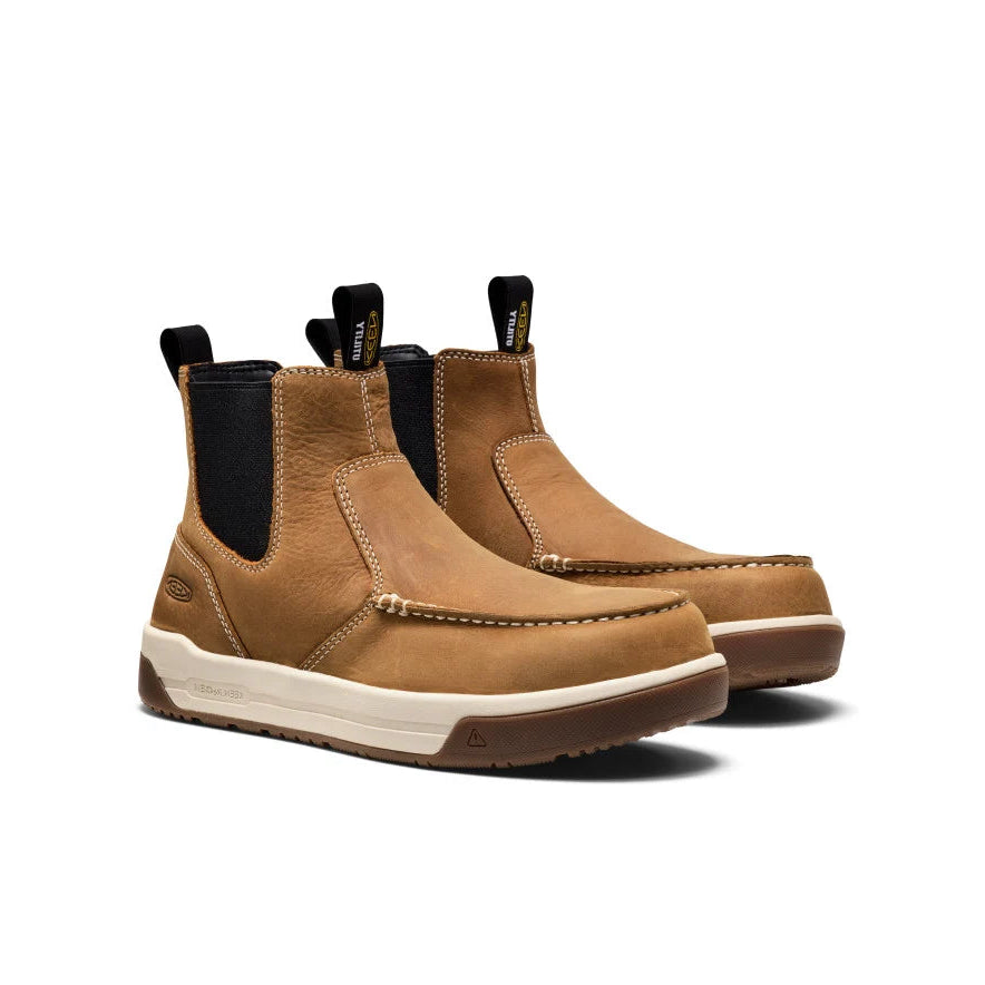 Pair of brown boots with black accents on a white background